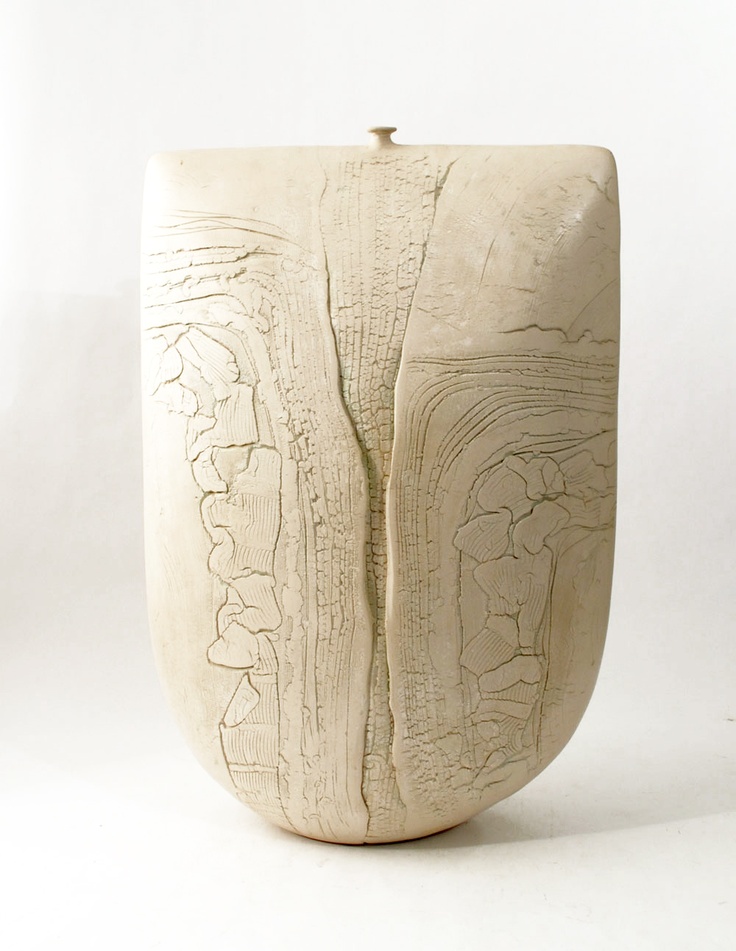 Peter Hayes. Unique stoneware vessel with creased surface and matte white glaze....