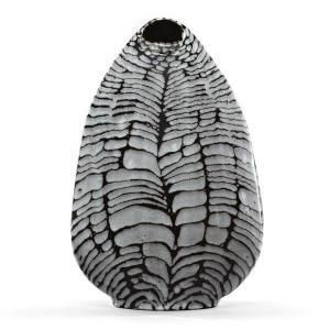 These elegant black and white slab-built vessels are by British artist James To...