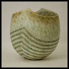 Unique stoneware vase with gray  and white striped matte glaze.  John Ward