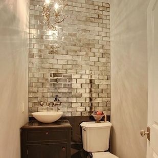 Mirrored tiles are a great substitute for a windowless room. | 33 Insanely…