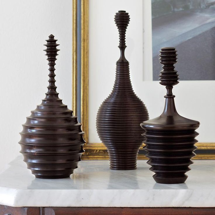 ebony vessels from Mozambique, made by african artisan women
