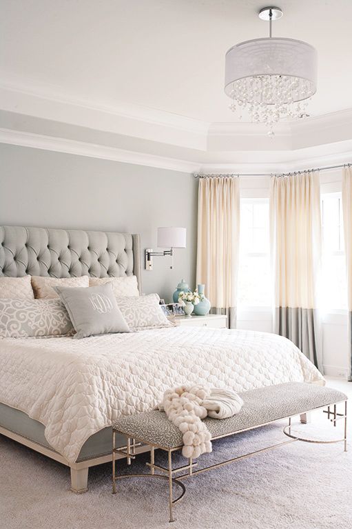 gray, white, and tan bedroom. Great two tone curtains and upholstered headboard!...
