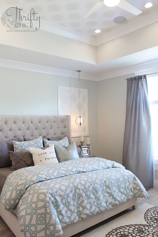 Soothing paint colors of blue and grey for this master bedroom. Thrifty and Chic...