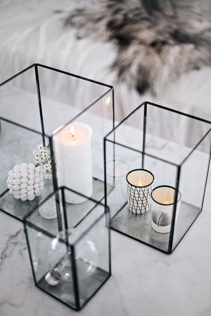 Loving this simple styled table with the candles and the white and black make it...
