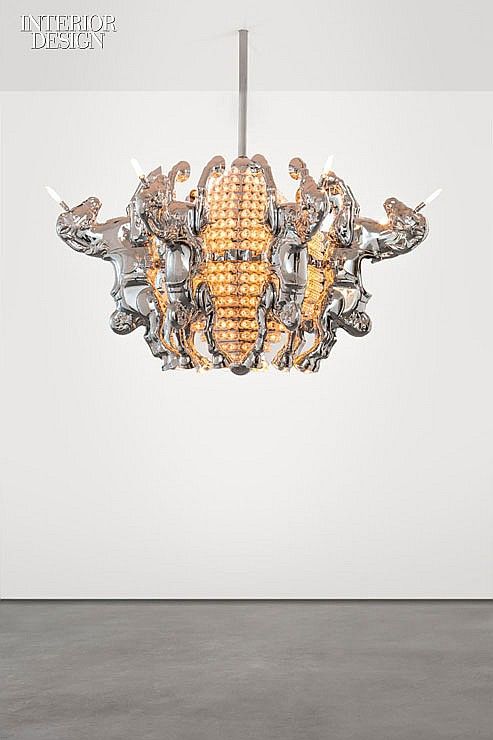 Designer Stuart Haygarth built this chandelier from  vintage fairground lights a...