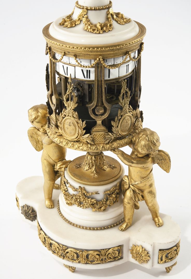 A Louis XVI ormolu-mounted white marble rotary clock circa 1780