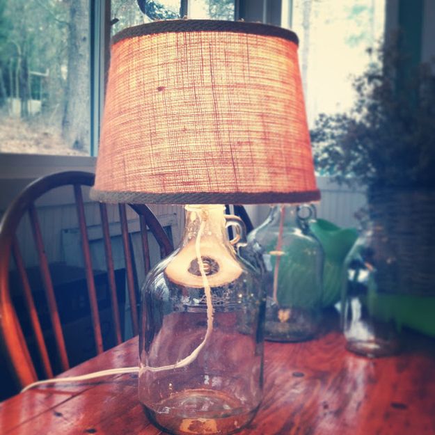 Build a glass bottle lamp. | 21 Pottery Barn Inspired DIYs
