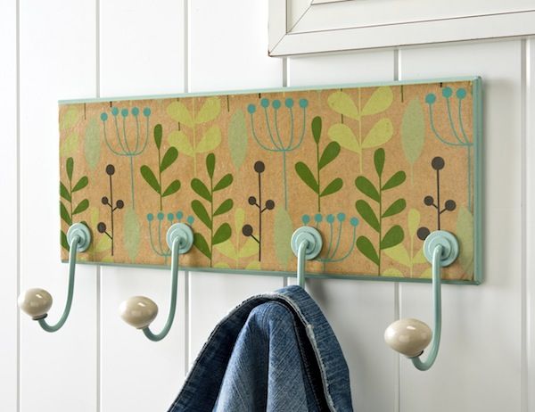 Floral DIY coat rack made with wrapping paper and Mod Podge