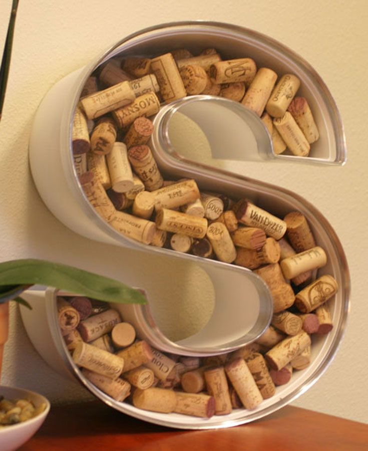 Wine corks inside of a letter for decor