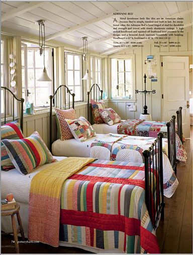 love the variety of quilts in this shared room...and the plank ceiling, and the ...