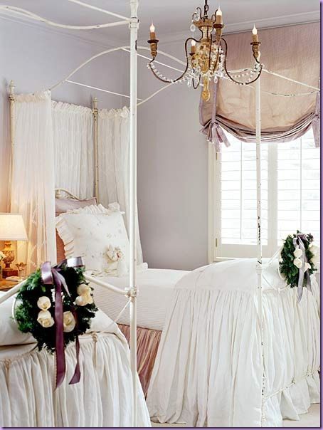 Room designed by Pamela Pierce, features lilac walls and peach roman shades.  Th...