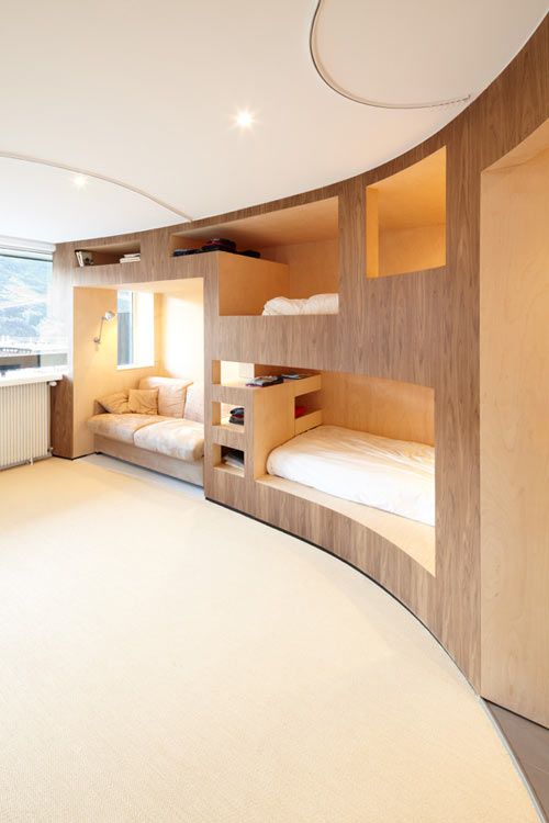 Sleek, Modern Chic Bunk Room in a Ski Resort Cabin by h2o Architectes