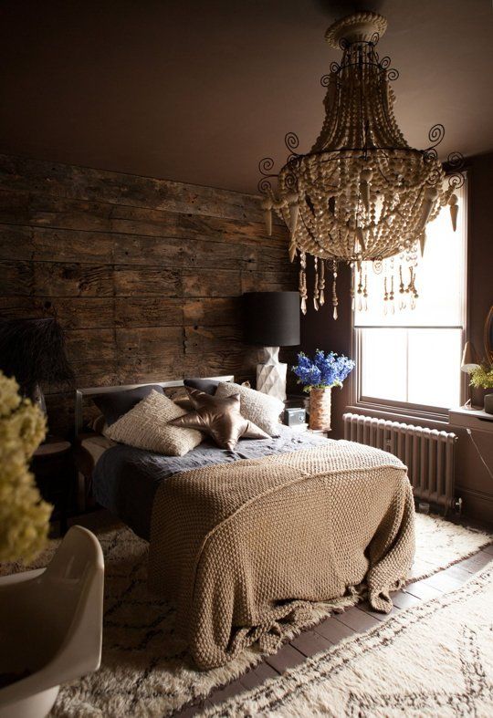 Wood plank wall, deep taupe ceiling and a grand old chandelier. Abigail Ahern&#3...