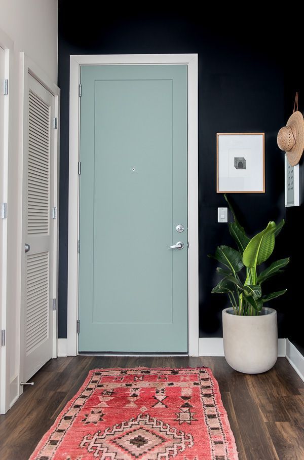 A Minimal Modern Entryway Makeover from White Walls to Dark and Dramatic