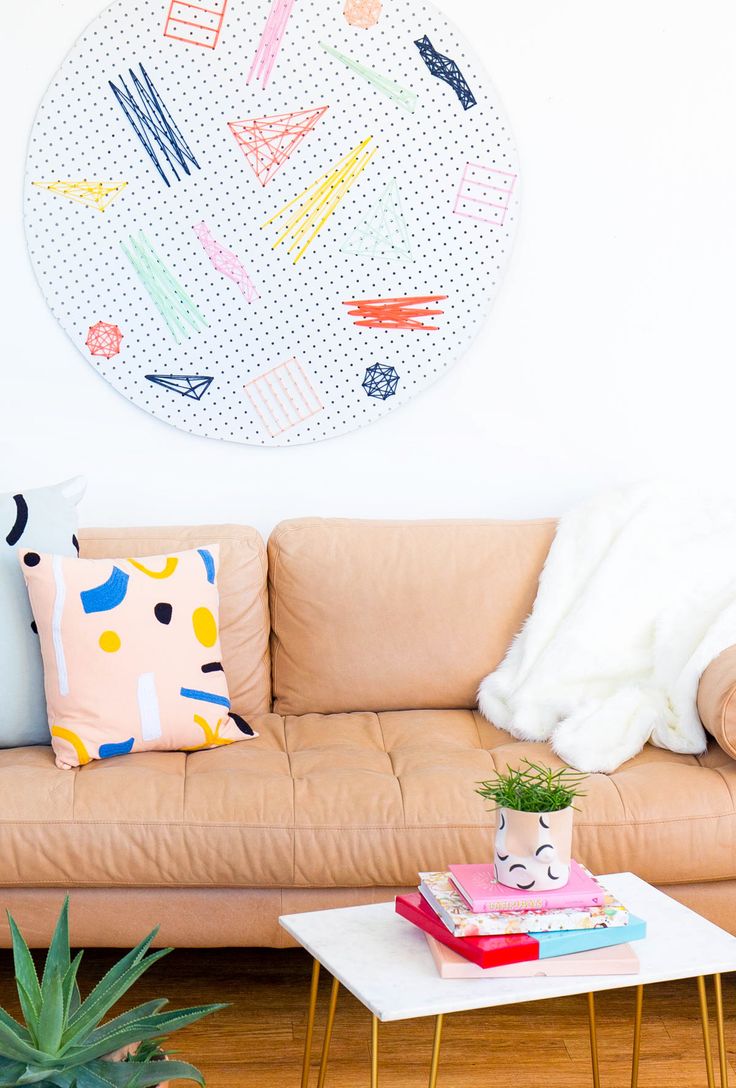 This DIY Pegboard Wall Art is a statement piece that you can make your own with ...