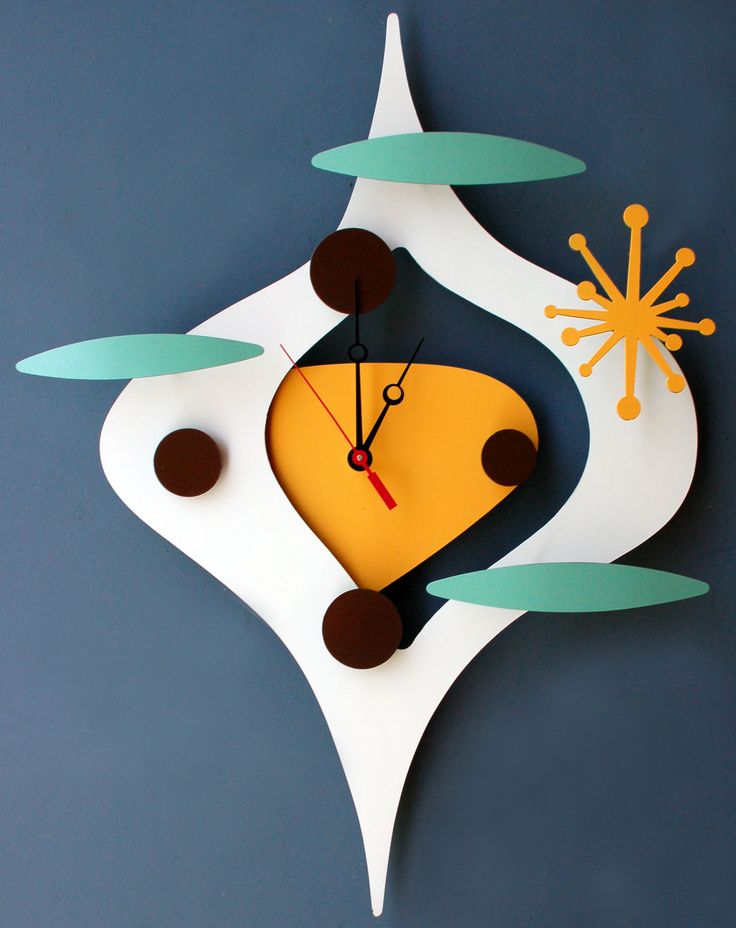 Retro space age clock. LOVE THIS SHAPE DESIGN!!