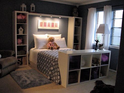 Instead of a headboard......Love the bookshelves 'framing' the bed, and ...