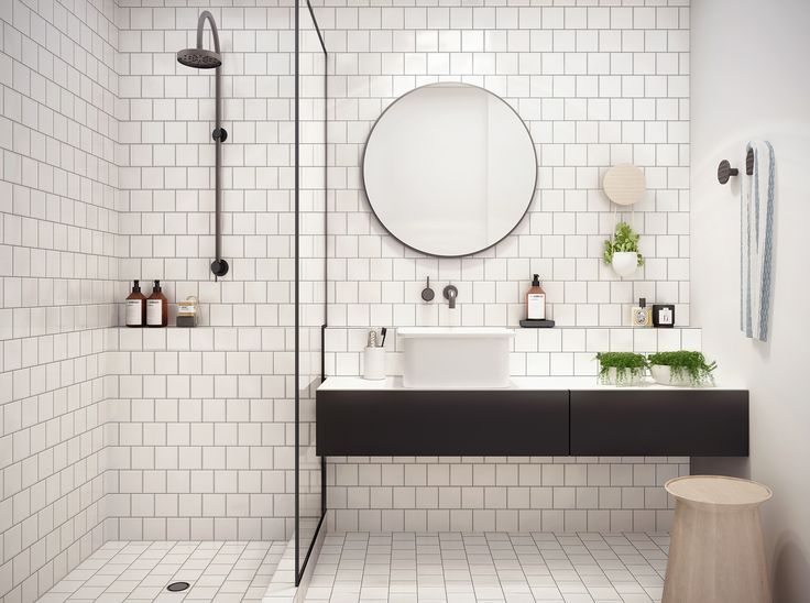 medium-size-round-mirror-in-white-tiles-with-black-grout