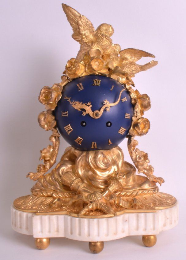 A 19TH CENTURY FRENCH ORMOLU ‘GLOBE BLEU’ CLOCK : Lot 323