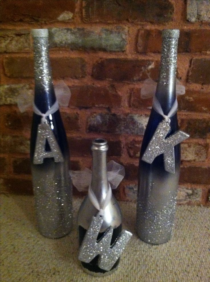 Easy! I sprayed the tall and short wine bottles (free from a friend) with silver...