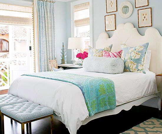 Bedroom with beautiful watery blues, crisp whites, and a few tropical accent hue...