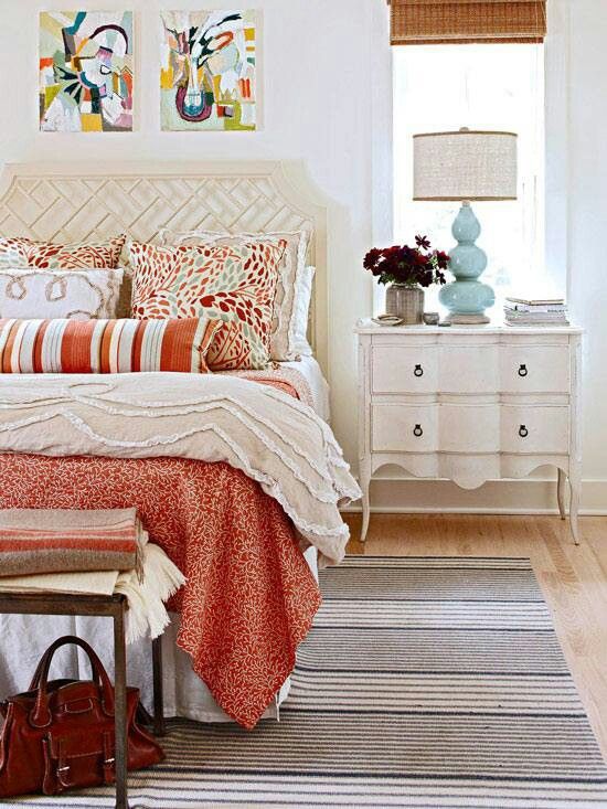 Simple and beautiful orange and white bedroom.