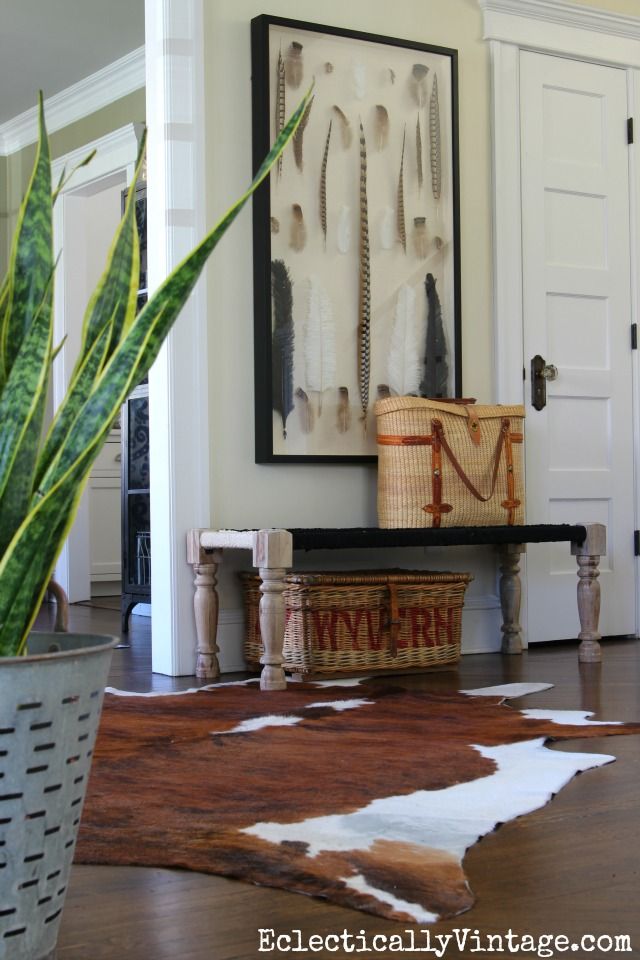 Eclectic entryway with bench