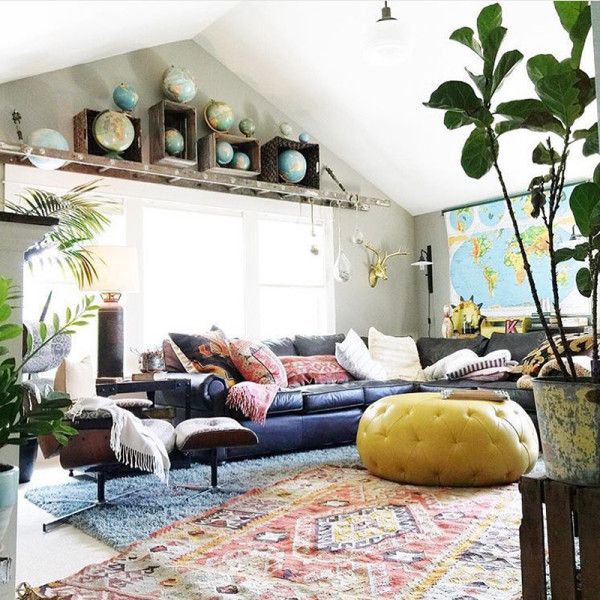 Quirky, colorful living room with prints and plants