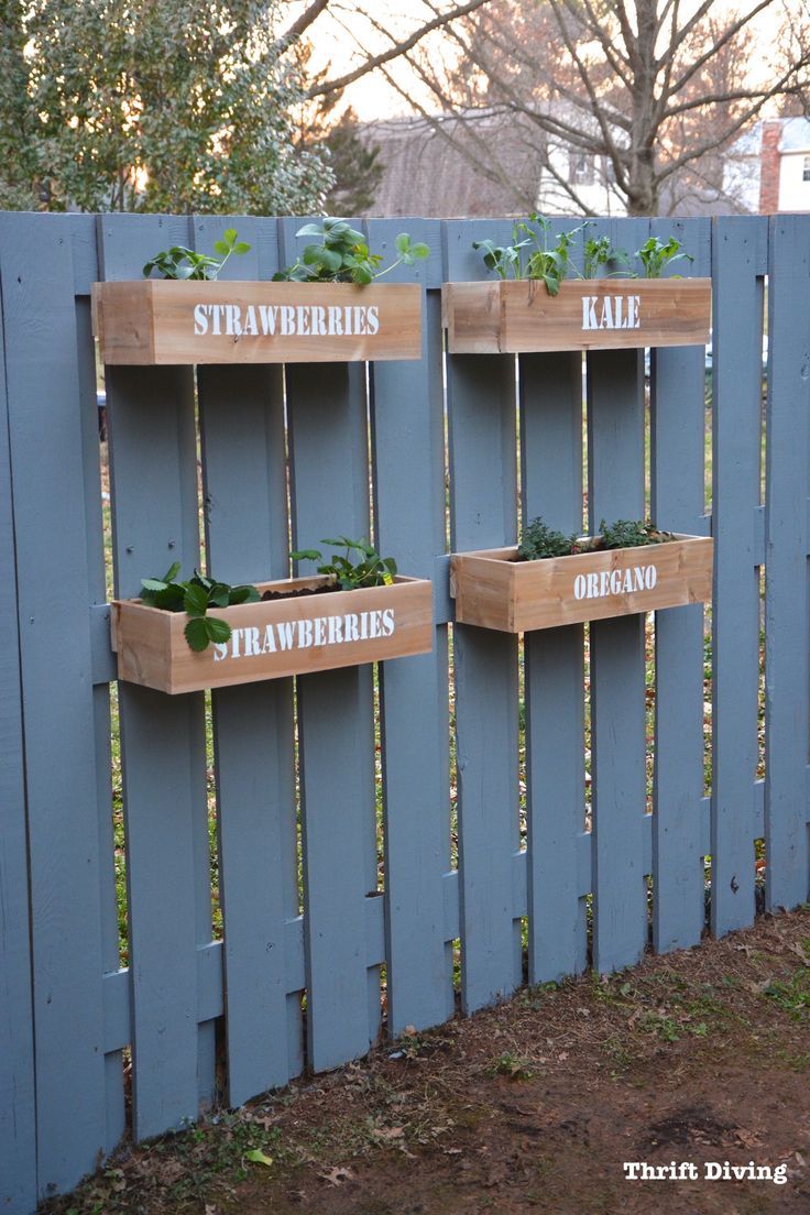 How to paint a fence and make stenciled cedar planters for a DIY hanging fence g...