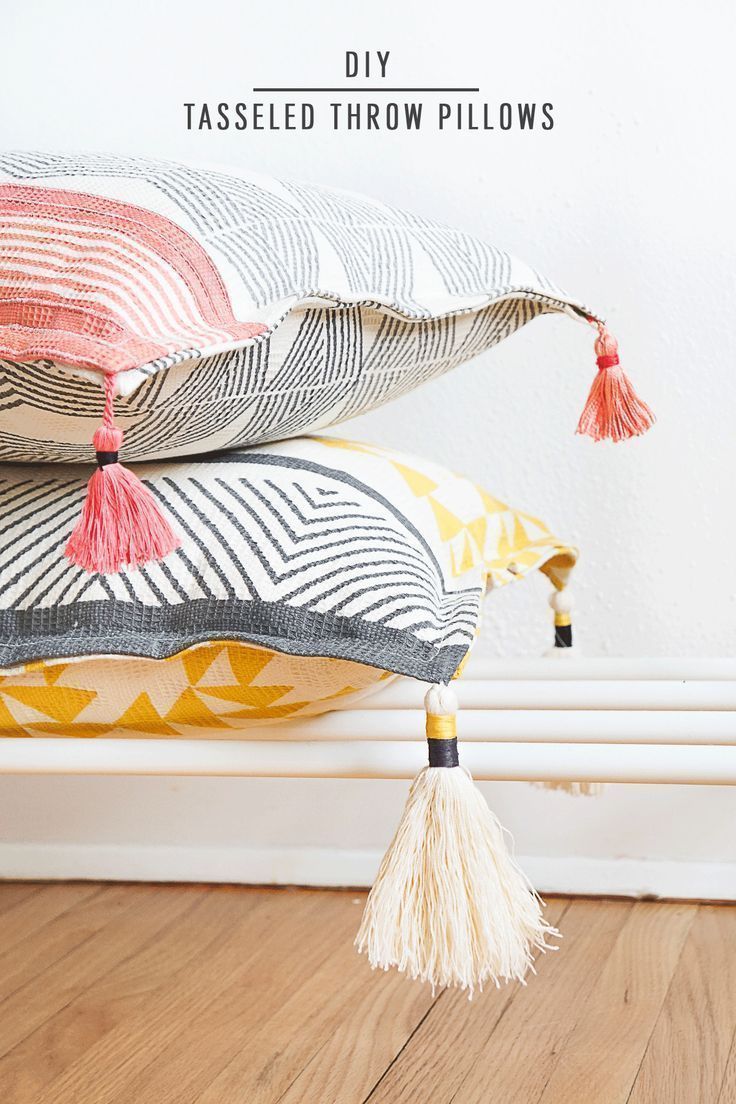 DIY Tasseled Throw Pillows by Ashley Rose of Sugar & Cloth, a top lifestyle blog...