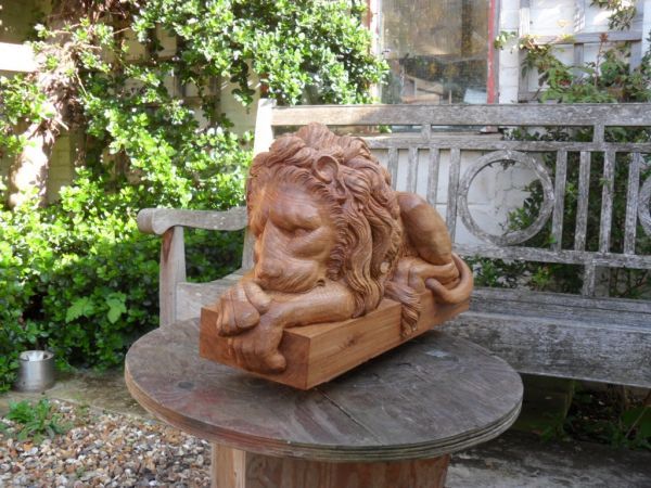 European #oak #sculpture by #sculptor David White titled: 'Seated Lion (Sleeping...