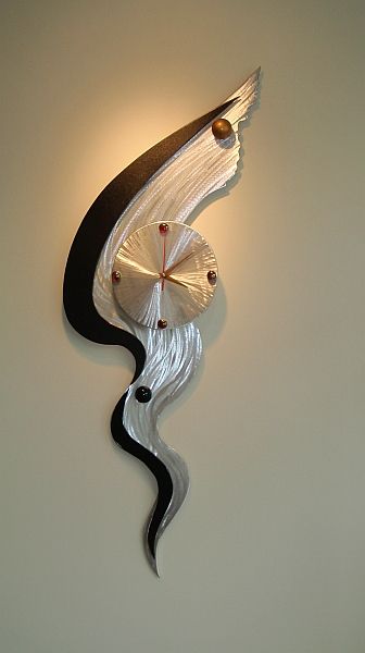 Wall Clocks | But also for his creative vision in designing the interior of Amer...