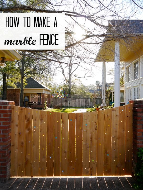 Add a little sparkle to your plain wood fence with marbles! It's easy!