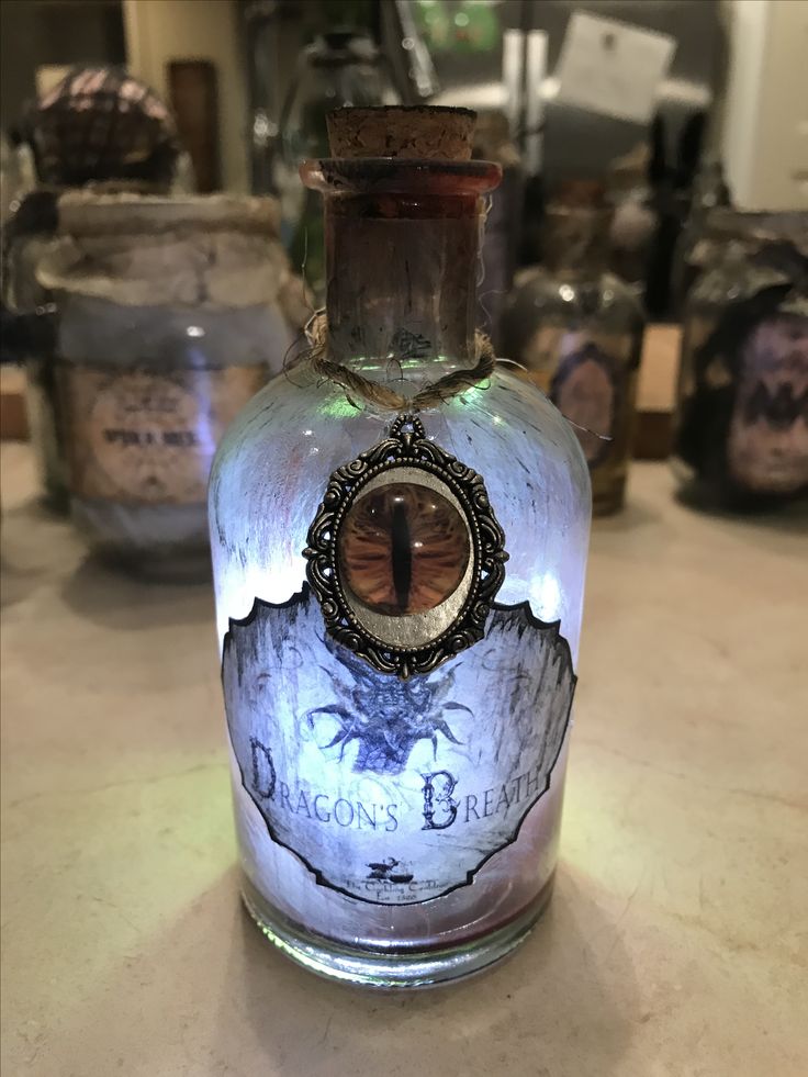 Glowing Dragon's Breath potion bottle. Shadow's Gate Haunt witch's m...