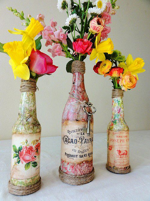 We can do something like this with the skeleton keys, hang them from bottle vase...