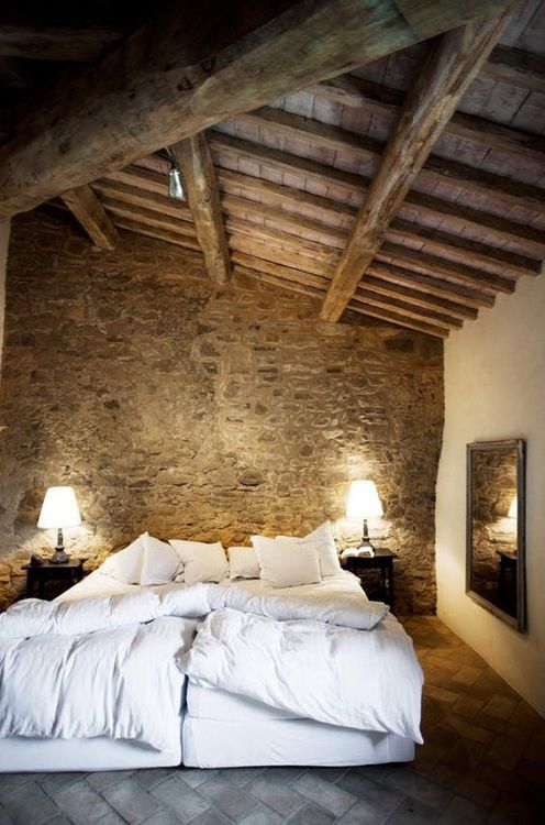 bedroom, brick wall, wood beams