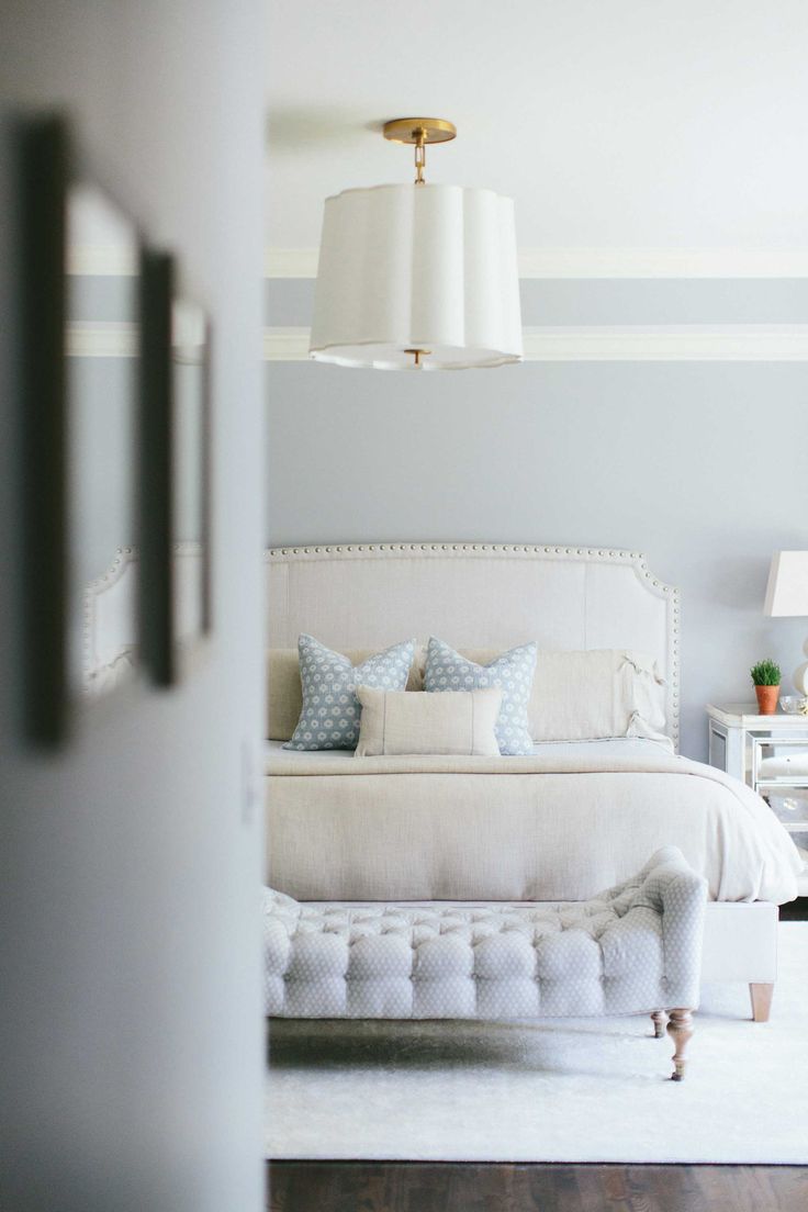 Neutral bedroom with touches of blue.