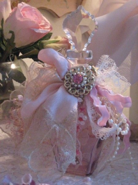 A little lace, some ribbon, a rose and a bottle....all created to have a lovely ...