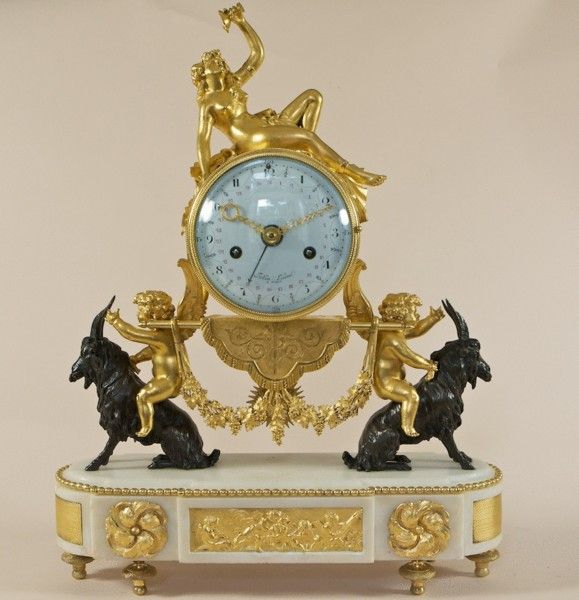 A good Louis XVI white marble, bronze and ormolu mantel clock, the dial signed F...
