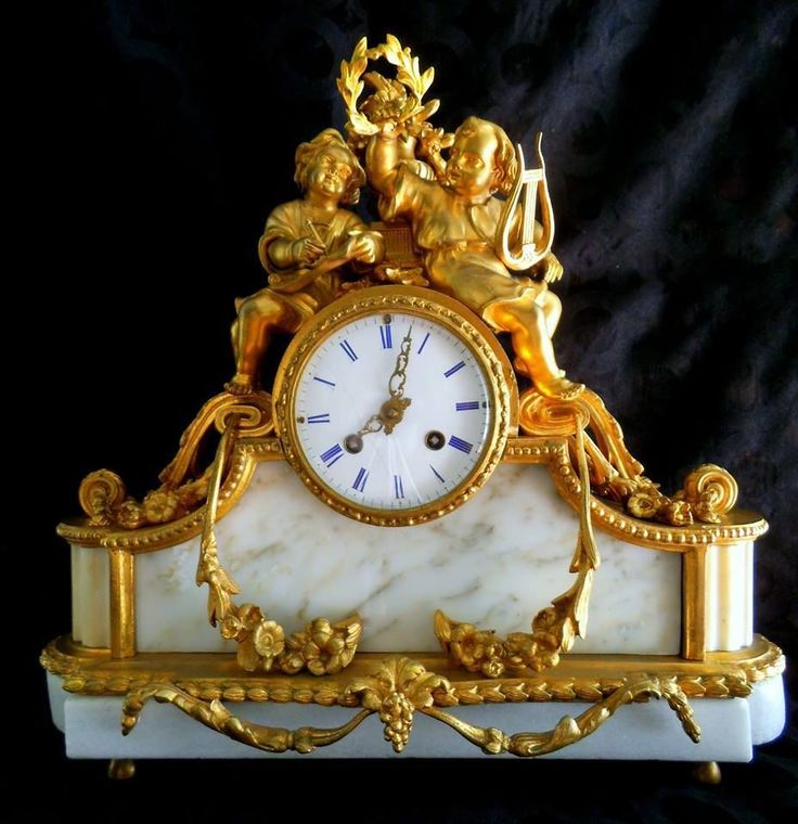 Antique 1790-1810 An Empire white marble and ormolu mantel clock French Louis XV...