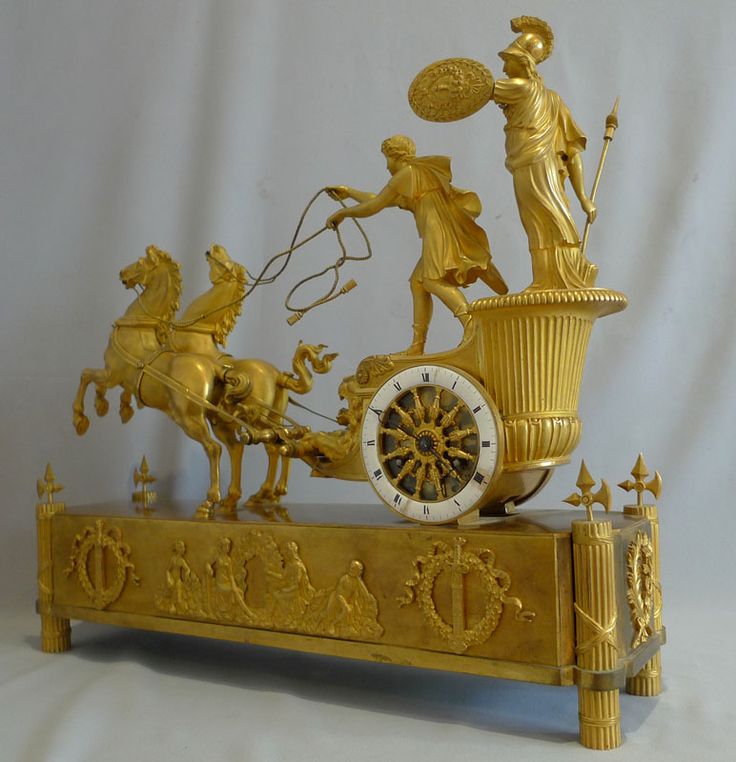 ** French Empire antique mantel clock of Minerva riding the chariot of Diomedes....