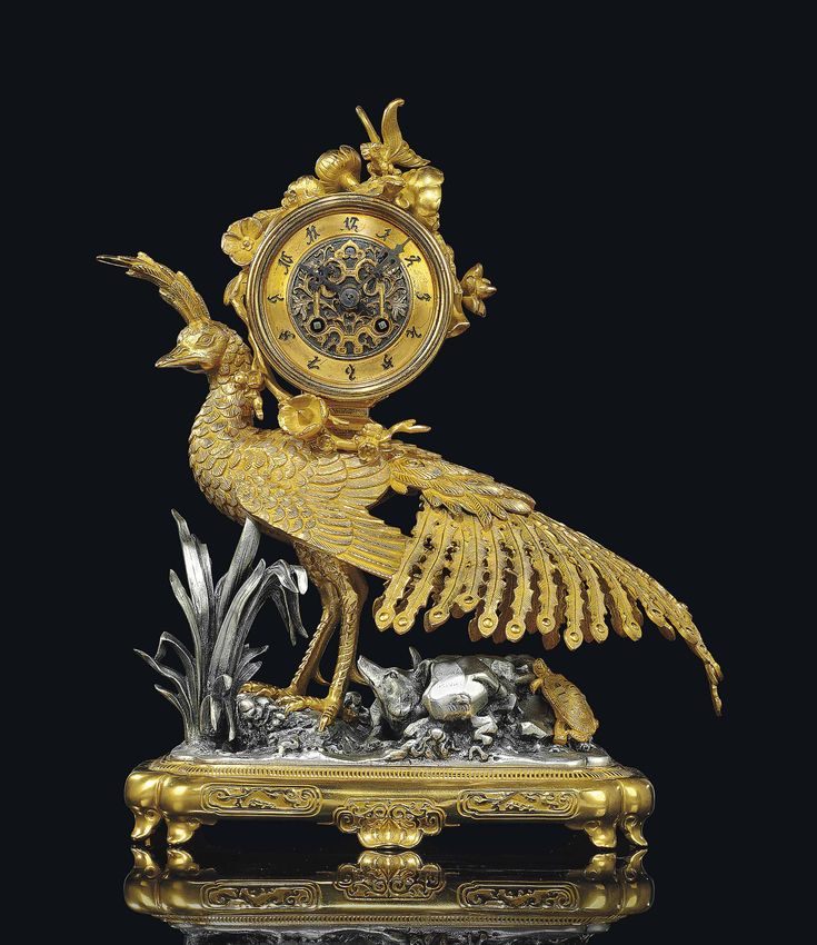 date unspecified A FRENCH 'JAPONISME' GILT AND SILVERED BRONZE CLOCK LAT...