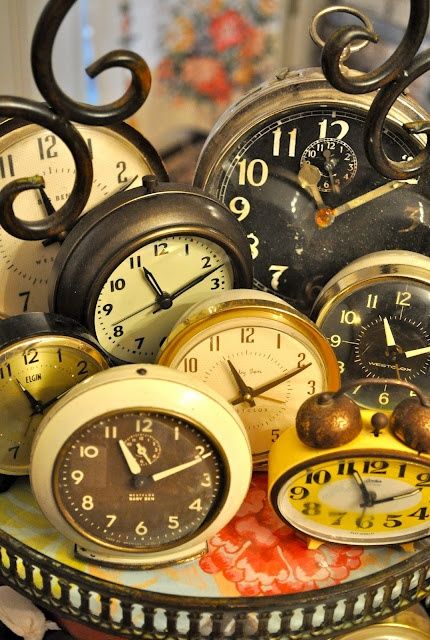 Tick Tock vintage alarm clocks and pocket watches.