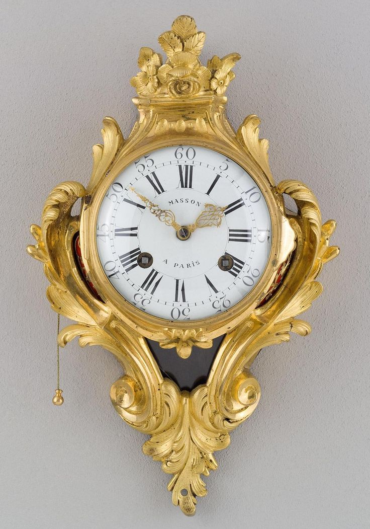 French Gilt Bronze Transitional Cartel Clock. Period ca. 1760-1770.