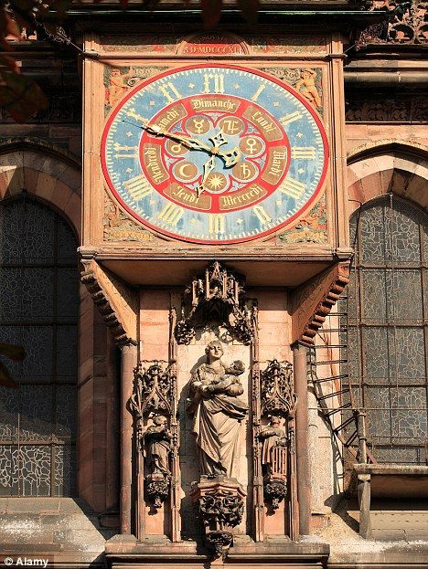Ornate: One of the city's clocks. The 15th Century cathedral's timepiece...