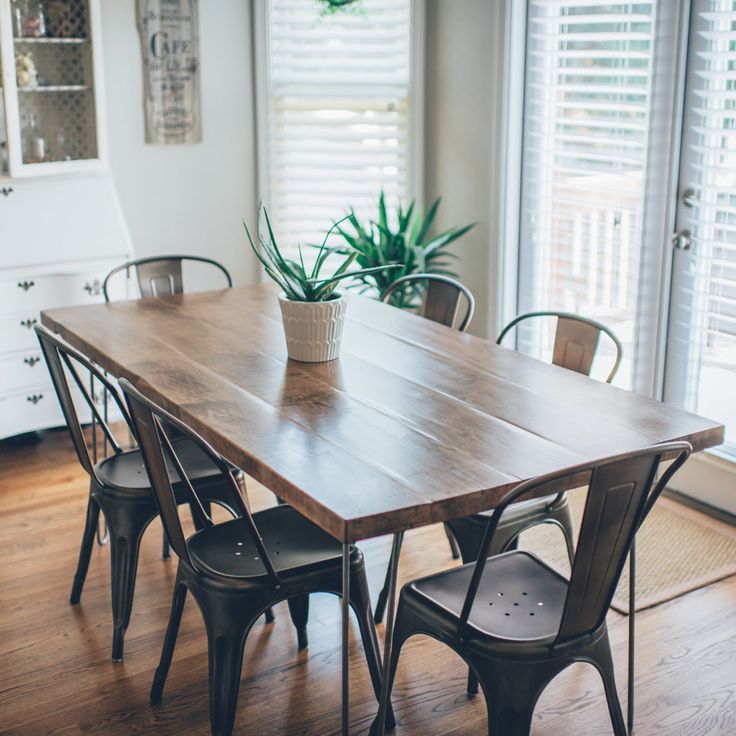 We wanted a kitchen table that was simple, neutral and could take a beating from...