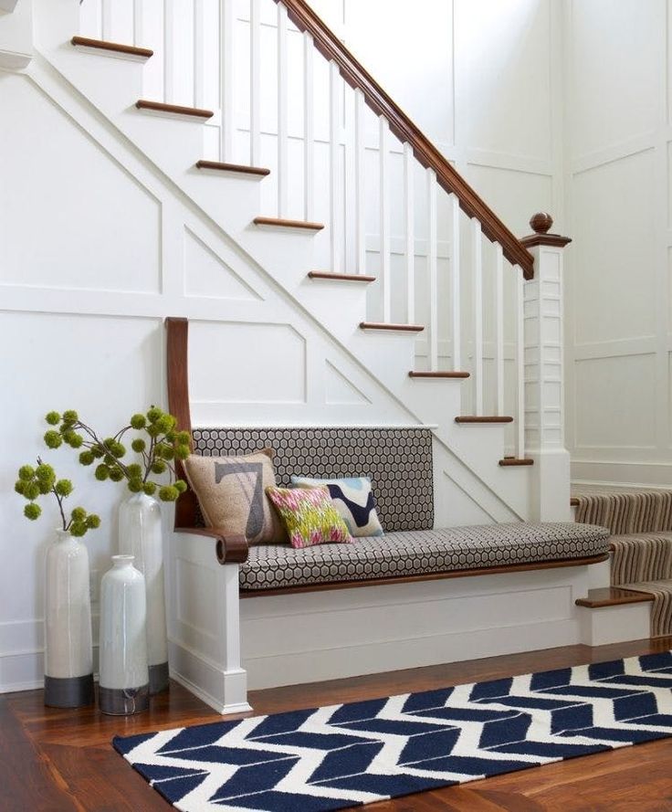 Bench at the foot of the stairs! Great storage