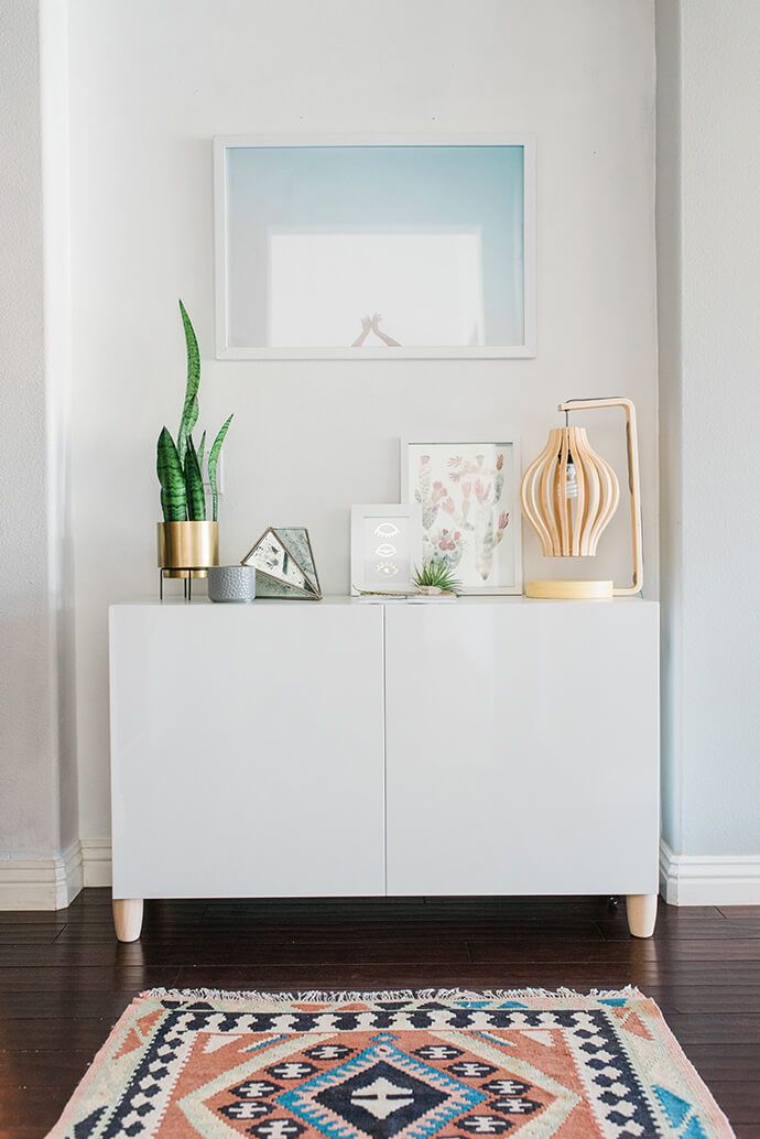 Chic white cabinet in entryway