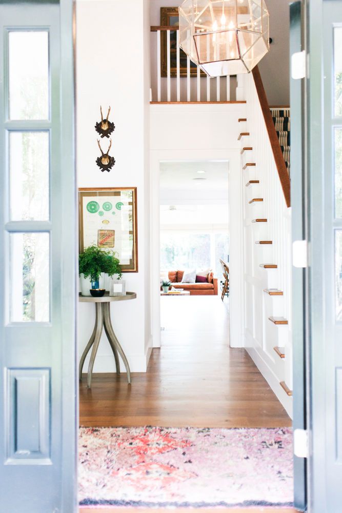 Modern entryway with blue doors