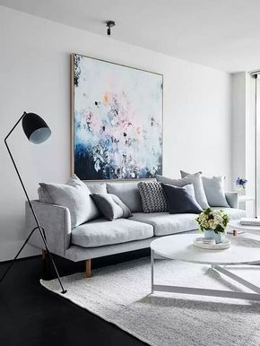 Grey sofa and blue artwork